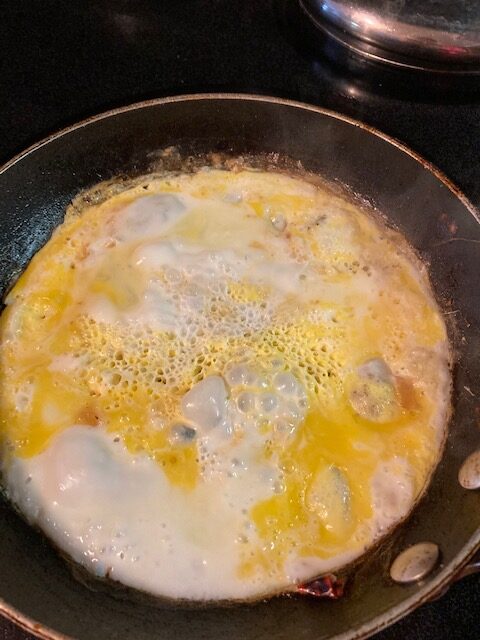 scrambled omelette like eggs before the frittata