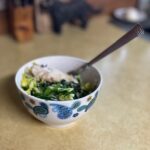 spring mix with onion, brown rice and chicken for lunch